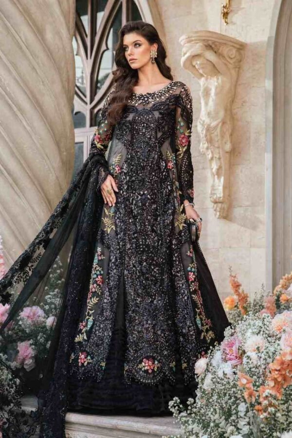 "Maria B organza outfit featuring a fully handmade front with intricate cut work, handmade neck, sleeves, embroidered back, and a ready-to-wear chiffon dupatta."